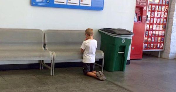 Mom finds son praying in Walmart – looks closer at board above him and realises heartwrenching truth