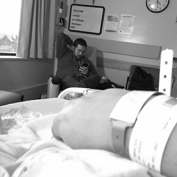 Nurse holding a patient's hand