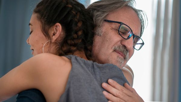 A man walking his stepdaughter down the aisle | Source: Shutterstock