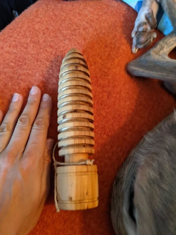 r/whatisthisthing - Oblong wooden object with grooves and a hole in it. Came in a box with a grain mill but doesn't belong to the machine.