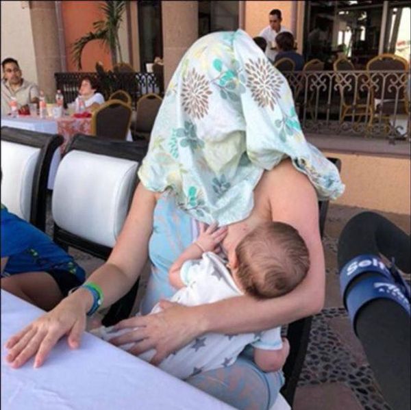 Mom ordered to cover herself up when she breastfeeds