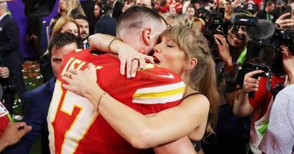 Taylor Swift and Travis Kelce celebrate on field after Kansas City Chiefs Super Bowl win