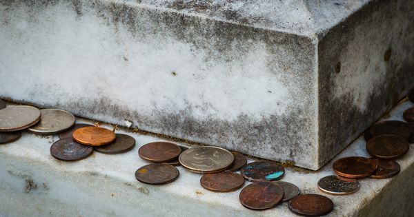 Coins on Gravestones