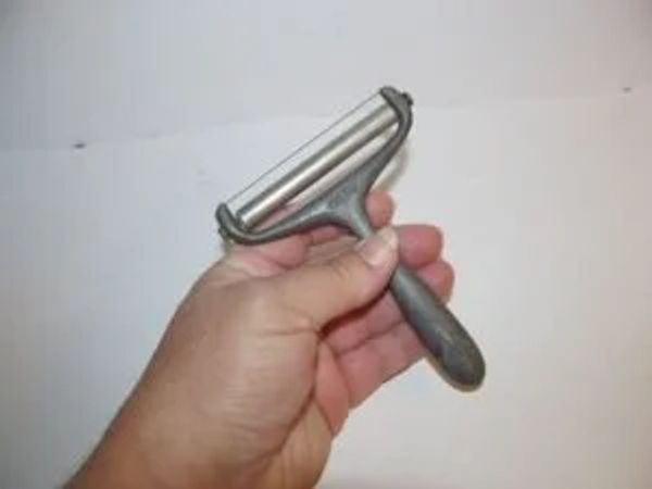 The Mysterious Vintage Presto Aluminum Cheese Slicer: A Blast from the Past!