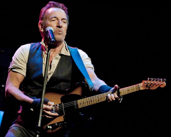 Bruce Springsteen performing on stage