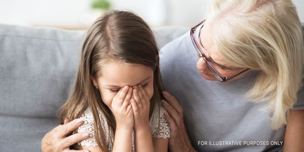 A child with her grandmother | Source: Shutterstock