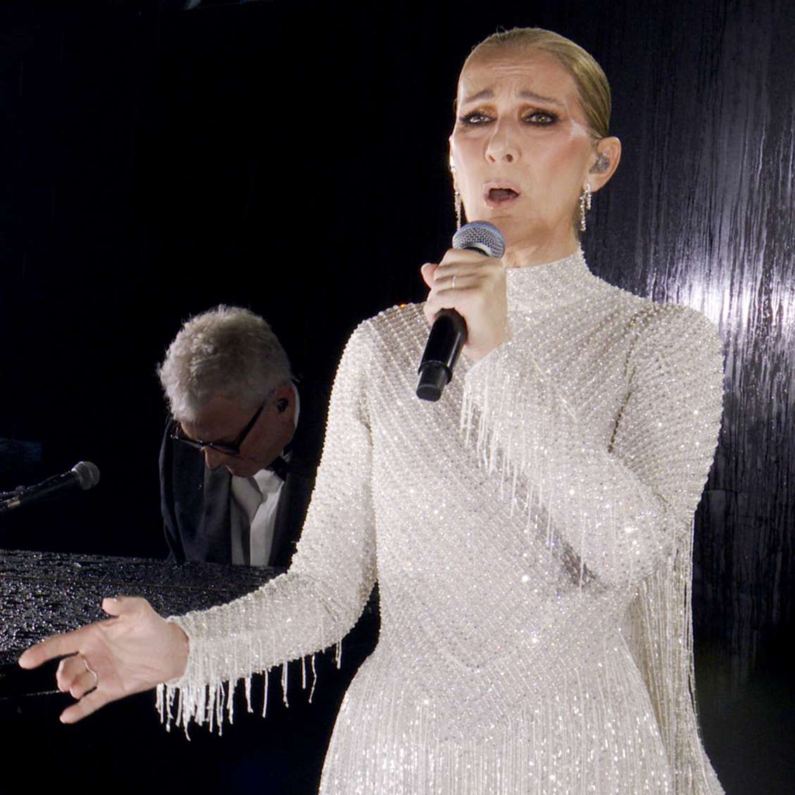 Céline Dion Sings Moving Rendition of ‘Hymne A L’Amour’ in Comeback