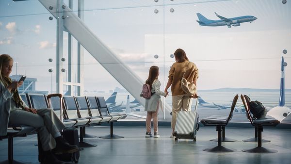 Suitcase on conveyer belt